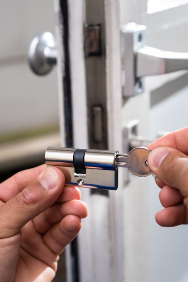 Locksmith,Lock,Door,Repair.,Worker,Changing,And,Cylinder