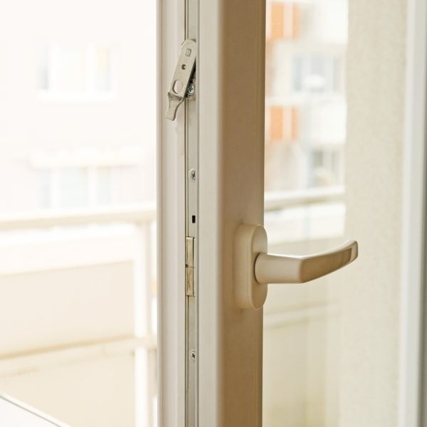 Close-up,Of,Modern,White,Upvc,Balcony,Sliding,Door,Handle,And